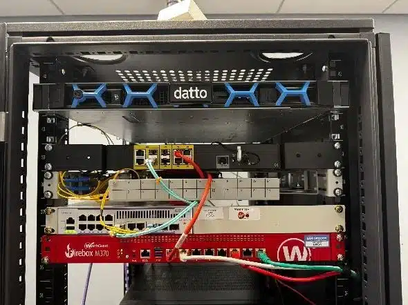 Relocated servers and firewall installed in a rack